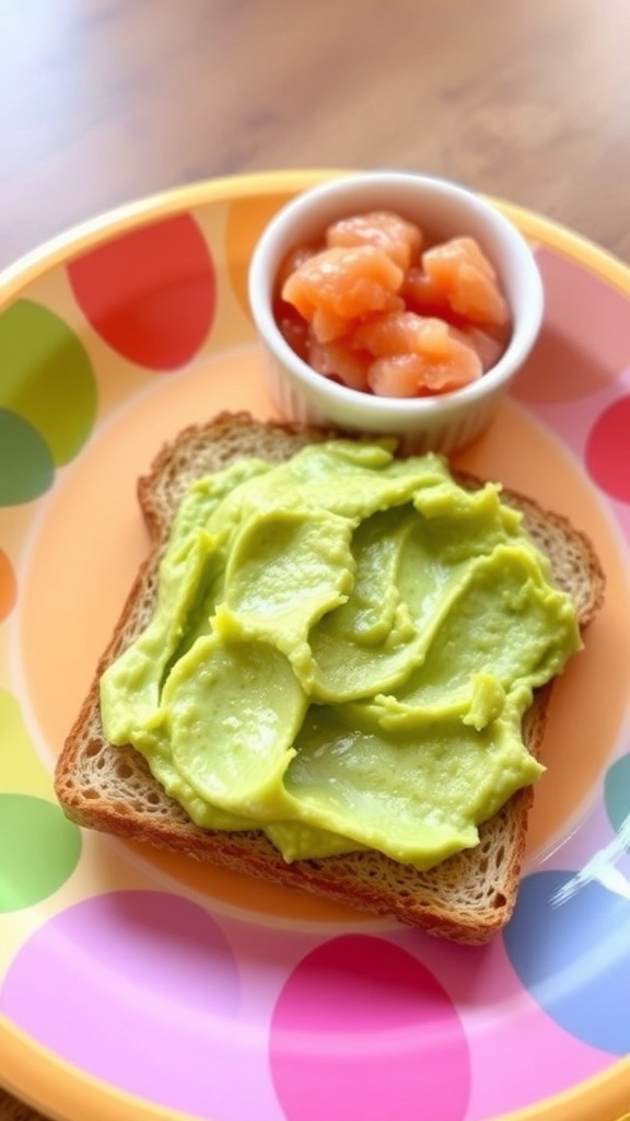 Whole grain toast with mashed avocado, cut into small pieces for a baby, alongside pureed fruit.